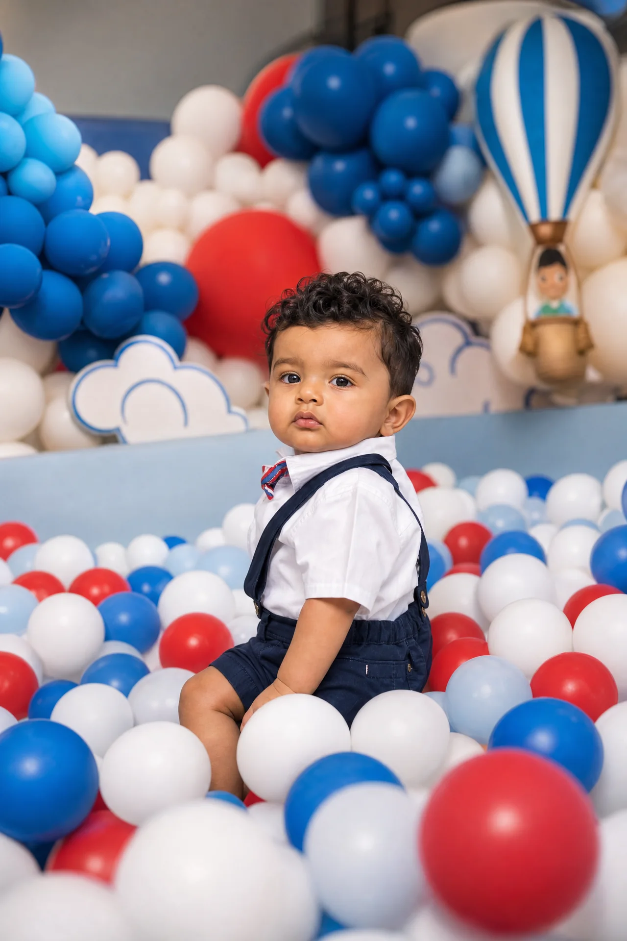 Aadi playing at his first birthday party